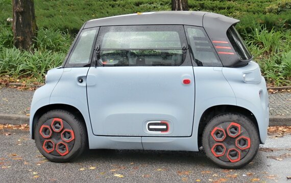 Citroen Ami electric microcar parking on urban street