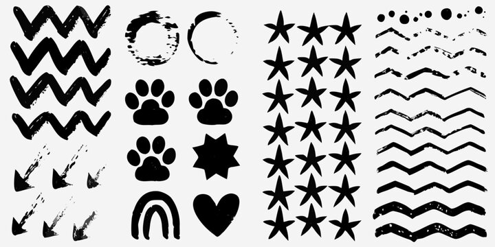 Collection of hand drawn black brushstroke shapes and patterns on white
