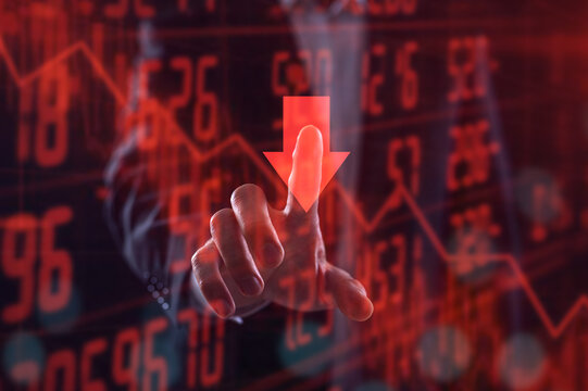 Stock Market Recession and Losses ,Businessman analysing trading downtrend line graph in bear market