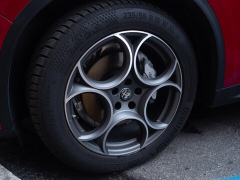 Alfa Romeo Stelvio wheel with Continental tire details showcasing alloy rim and brake caliper, automotive styling