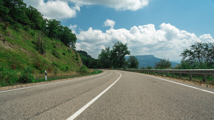 Fototapeta premium empty road in the mountains without people and without cars