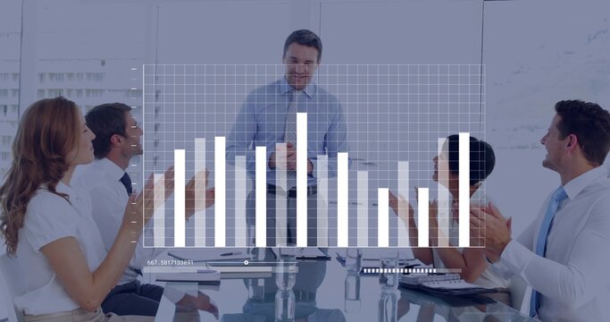 Presenting man wearing blue shirt leading meeting in glass conference room with bar chart overlay