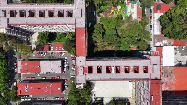 Vertical aerial shot of famous cupa apartment building in mexico city