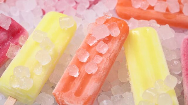 Colorful ice pops in row with slow camera push in close up