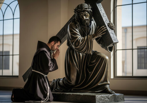 Franciscan friar praying beside statue of Jesus bearing cross in sunlit chapel.