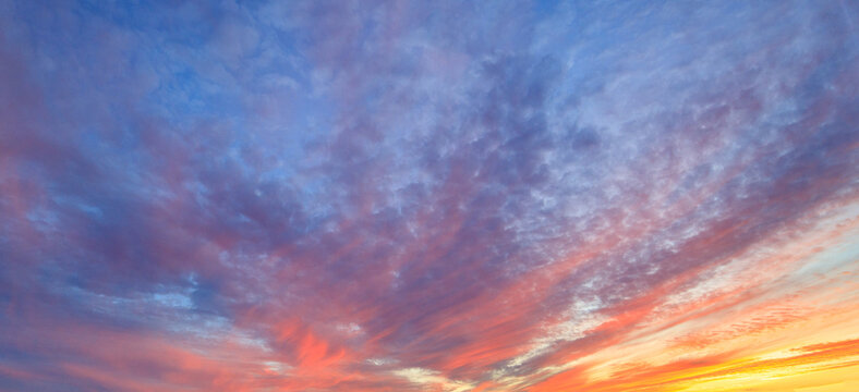 Dramatic sky glows with fiery hues