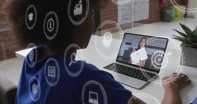 Seated woman viewing laptop as host showing pages and causing icons, reaching trackpad for learning