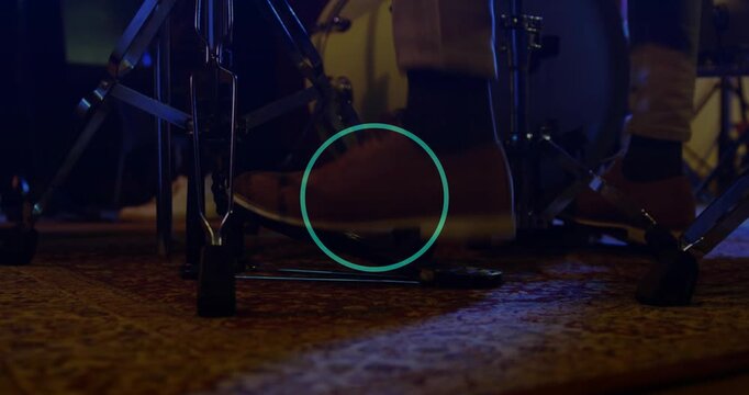 Drummer foot placing, pressing kick pedal, dotted overlay pulsing over pedal, keeping music beat