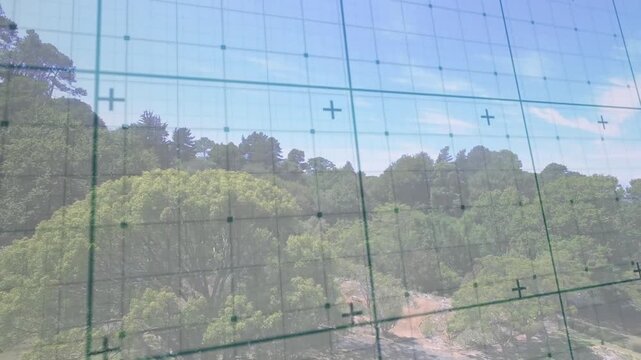 Handheld camera starting with tilt, panning up right, sliding grid, revealing horizon for alignment