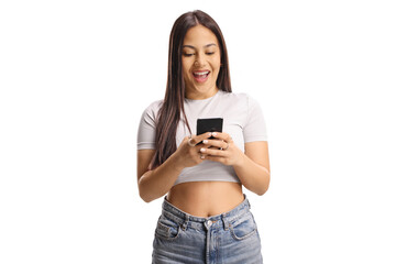 Young woman looking at her smartphone with an excited expression