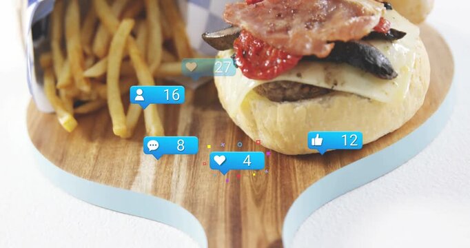 Burger and fries, one bubble appearing, badges grouping around food, counts updating for marketing