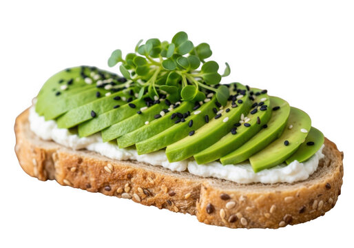 Slice of bread topped with avocado and garnished with fresh greens isolated on transparent background