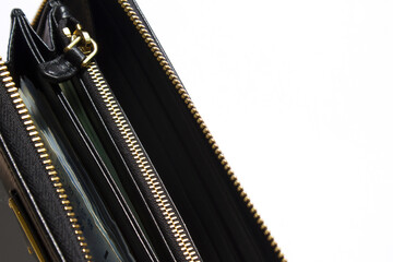 Obraz premium black wallet open over white background
