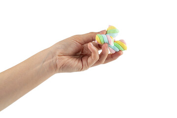 Fototapeta premium Marshmallow pastel colors and hand on transparent background.