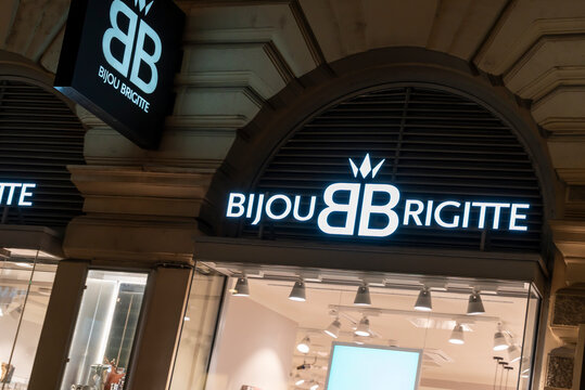 Vienna, Austria- Feb 21, 2026: Night view of Bijou Brigitte store showcasing illuminated logo and stylish storefront. The unique design attracts attention in the bustling shopping district.