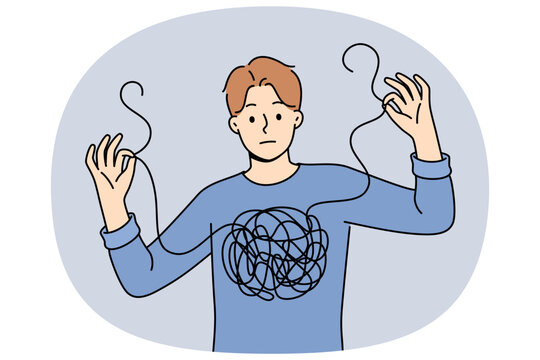 Man confused in himself and in feelings, shows lump of threads in chest and needs help of psychotherapist. Guy confused and cannot independently deal with mental health, suffered due to depression.
