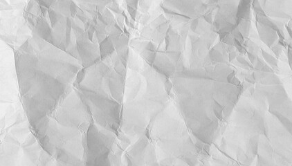 Naklejka premium Old crumpled paper sheet with torn edges and weathered texture. Blank white background ideal effect.