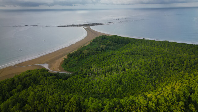 Aerial view of the Whale Tail at Marino Ballena National Park, where the ocean meets the sandy shore, Uvita, Puntarenas Province, Costa Rica.
