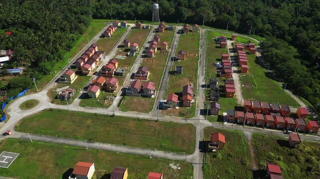 higher rotating view capturing surrounding neighborhood, clean residential blocks, and developing Alfonso community at Camella Homes Alfonso Cavite Philippines