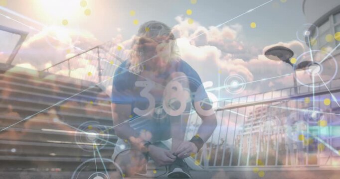 Animation of numbers increasing, connected dots over caucasian man tying shoelace on steps