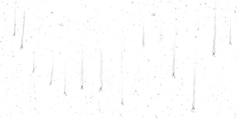 A series of vertical rain streaks running down a glass surface against a bright white background ©  Designer