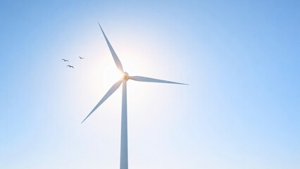 Fototapeta premium Minimal wind turbine with the sun behind and birds flying nearby, blue sky and calm atmosphere