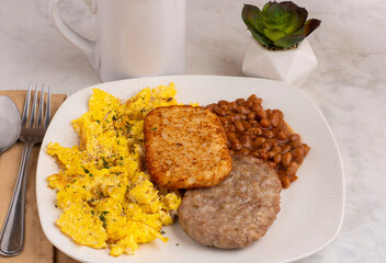 scramble eggs  with sausage and baked beans