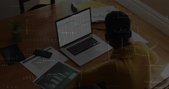woman working at wooden desk in home office, displaying animated finance charts and phone icons