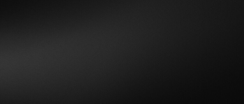 A dark background with a subtle gradient effect  a uniform black color with a slight light reflection on the left side