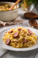 Traditional Polish Łazanki with Sauerkraut and Sausage – Homemade Comfort Dish. AI generative.