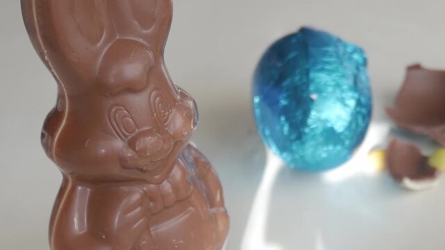 Cute chocolate bunny and foil egg for Easter delight and joy