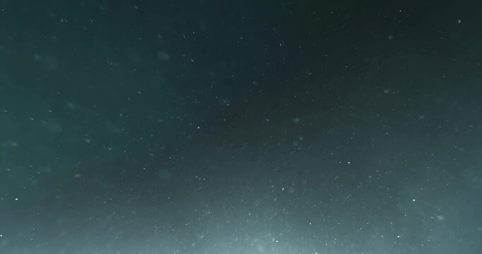 Cinematic 4K underwater footage captured from the POV of a deep-sea ROV drone, drifting through a vast, atmospheric water column filled with floating particles, soft light rays, and immersive depth&mdash;pe