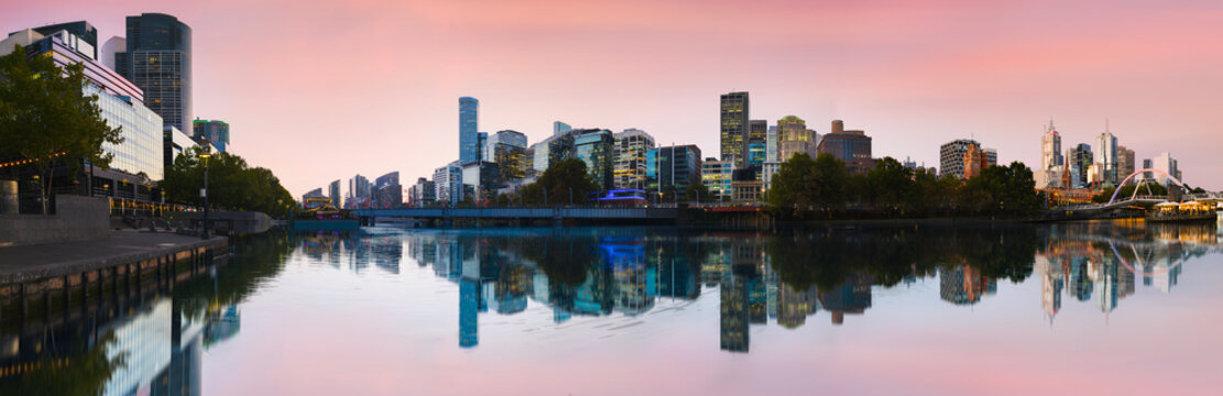 Melbourne city sunset skyline over the Yarra River Marina, Victoria, Australia