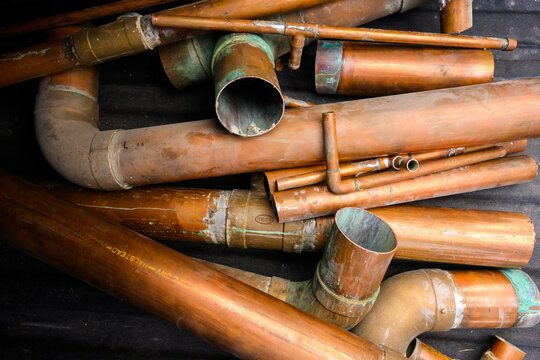 old scrap copper pipe with patina and brass good texture