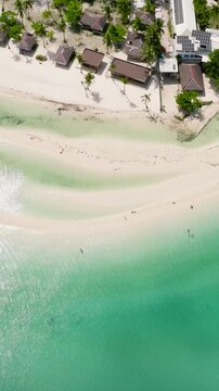 Tropical beach with palm trees. Bantayan island, Philippines.
