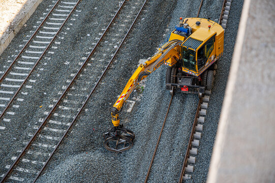 Vaia Car rail-road excavator used for railway track maintenance. Heavy machinery positioned on tracks, infrastructure work, engineering and industrial scene,  in Durres, Albania 03.26.2026