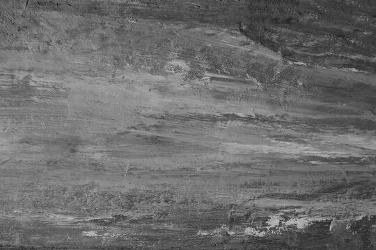 Closeup detail of abstract rough dark grey gray beige black art painting texture with oil acrylic brushstroke pallet knife paint on canvas geometric spatula technique with curves chaos messy lines.
