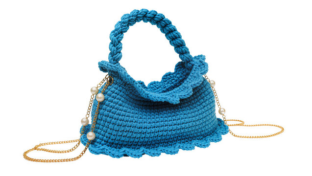 Bright blue crocheted hobo bag, adorned with lustrous pearl accents and a gold chain strap