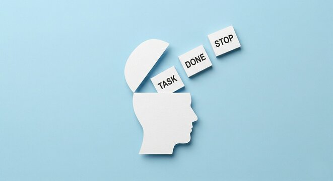 Conceptual image of an open human head silhouette with "TASK", "DONE", and "STOP" blocks
