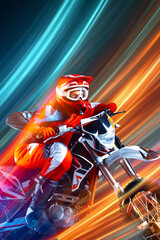Close up motocross rider with colorful speed light motion effect. Concept of adrenaline rush, high speed performance, extreme sport energy, dynamic movement, modern action visual. © Lustre Art Group 
