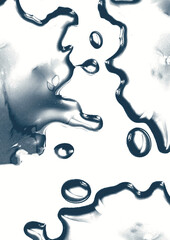 gouttes d'eau colorées sur surface avec éclaboussure © Studioliloug