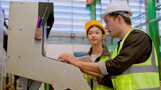 Collaborative training session for young engineers industrial workshop educational content indoor environment close-up view skill development