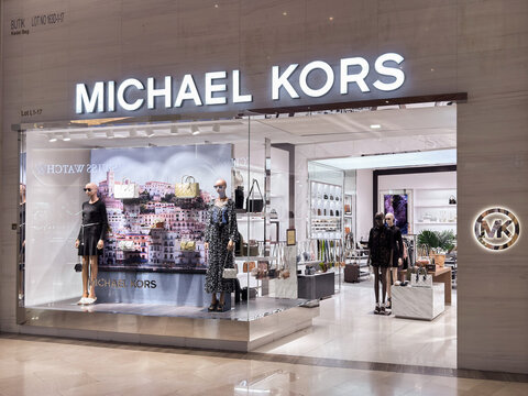 Stylish michael kors storefront showcases elegant fashion accessories in penang mall, malaysia