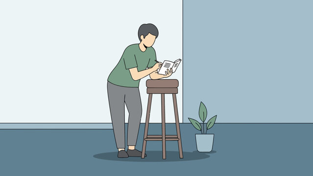 Man reading a book on a stool in a minimalist room with a plant