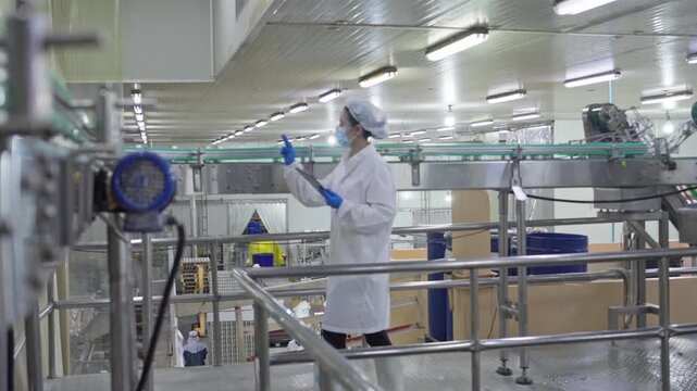 Quality control inspection process manufacturing facility industrial content cleanroom environment worker perspective