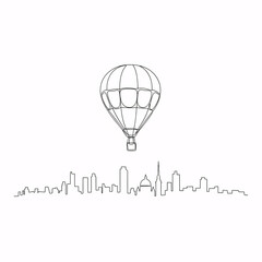 Fototapeta premium Hot air balloon flying over city skyline.