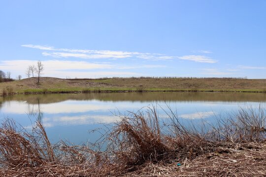 The quiet lake in the country on a sunny day.