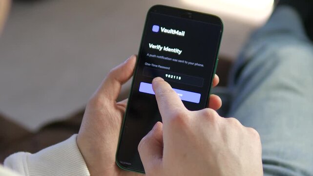 Secure 2FA identity verification on a smartphone. User interacts with a modern app UI to authorize access with a one-time password. Essential for cybersecurity, fintech, and data privacy marketing