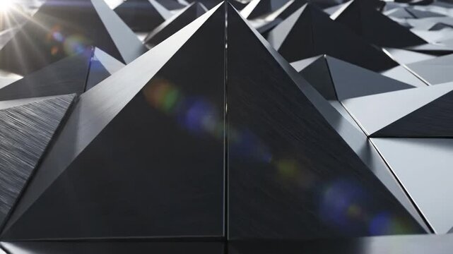 Modern brushed metal triangular pattern with bright lens flare