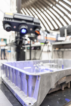 3D quality control inspection of an automotive vehicle part in modern manufacturing